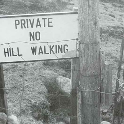 'Private no hill walking' sign on fence; credit Sam Maynard