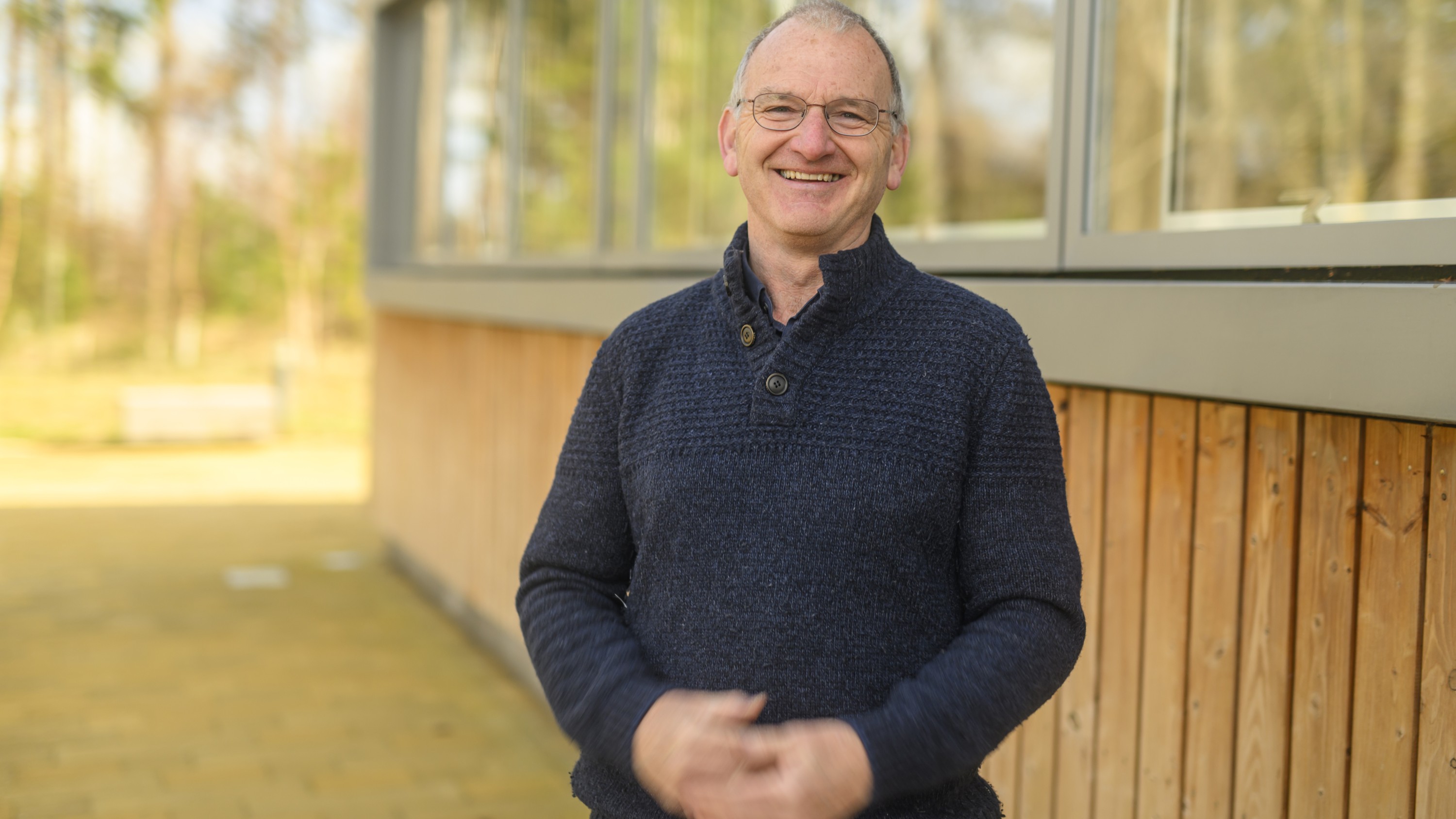 Neil Cleland standing outside