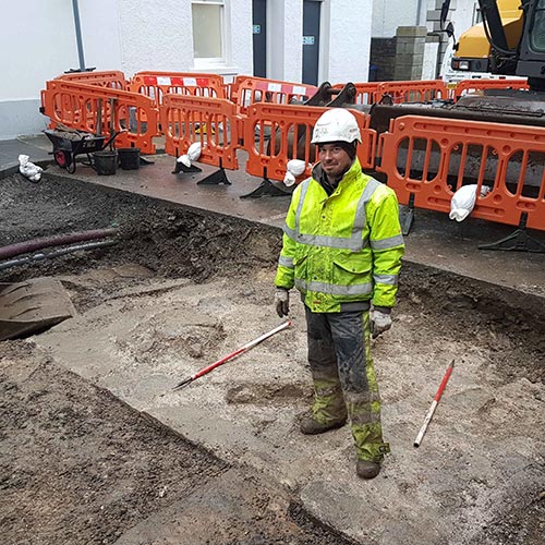 A team of archaeologists unearthed sections of wall and cobbled surface while undertaking a project in Kirkwall.