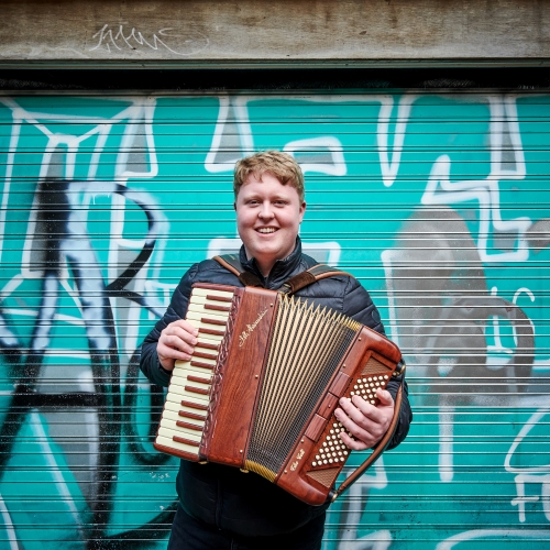 Person playing an accordion