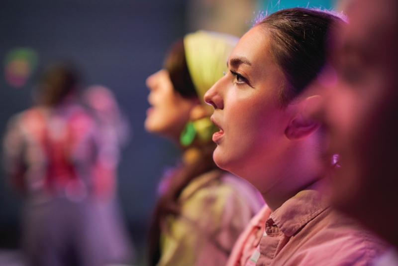 Close up of students during a performance rehearsal.