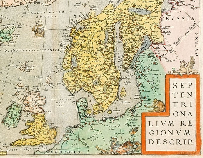 Antique Latin map of Northern Europe showing Scandinavia, the British Isles, and surrounding seas with decorative sea creatures and ships.