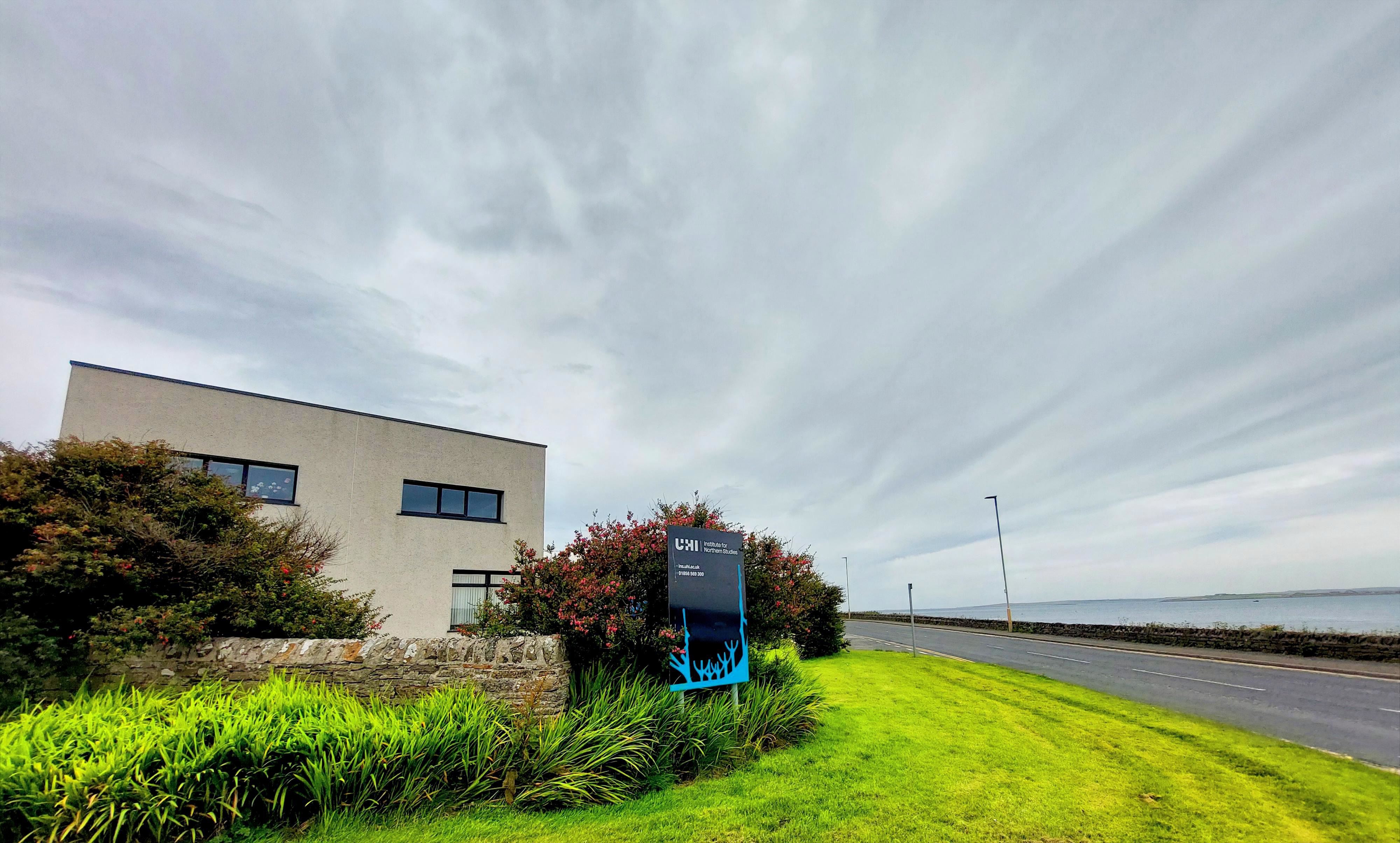 A photograph showing the INS building