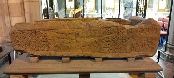The Govan sarcophagus, viewed from the side, showing intricate carvings.