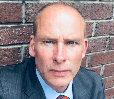 A photograph of Dr Iain MacPherson