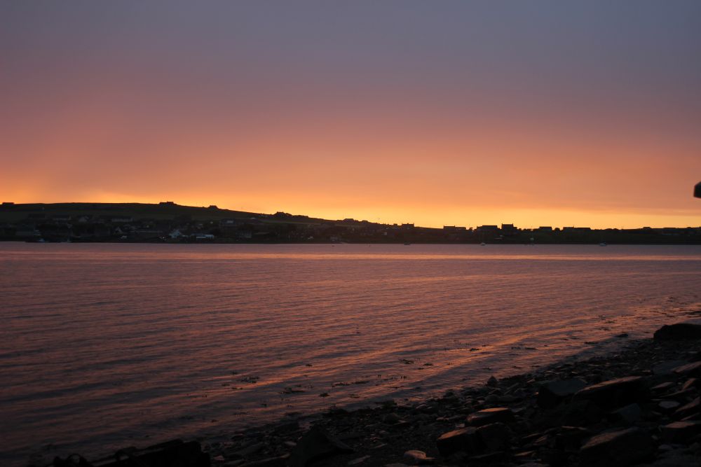 A photograph of St Margarets Hope at Sunset Orkney