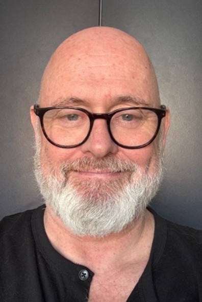 A picture of PhD student John Peach