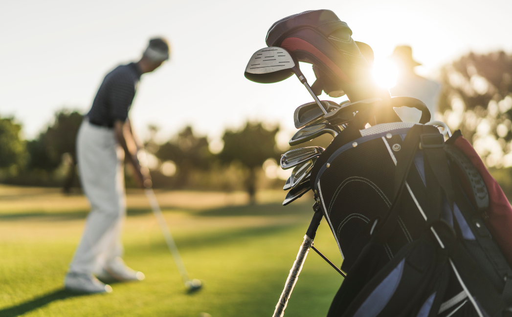 Person playing golf Person playing golf